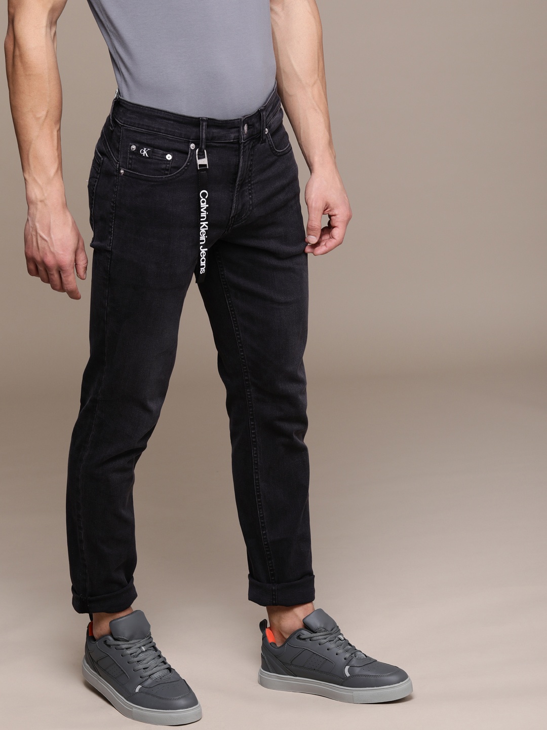 

Calvin Klein Jeans Men Black Tapered Fit Stretchable Jeans