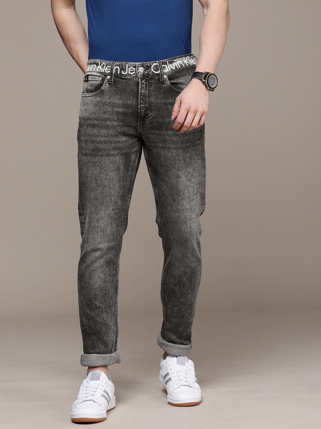 

Calvin Klein Jeans Men Grey Slim Taper Fit Mid Rise Heavy Fade Stretchable Jeans