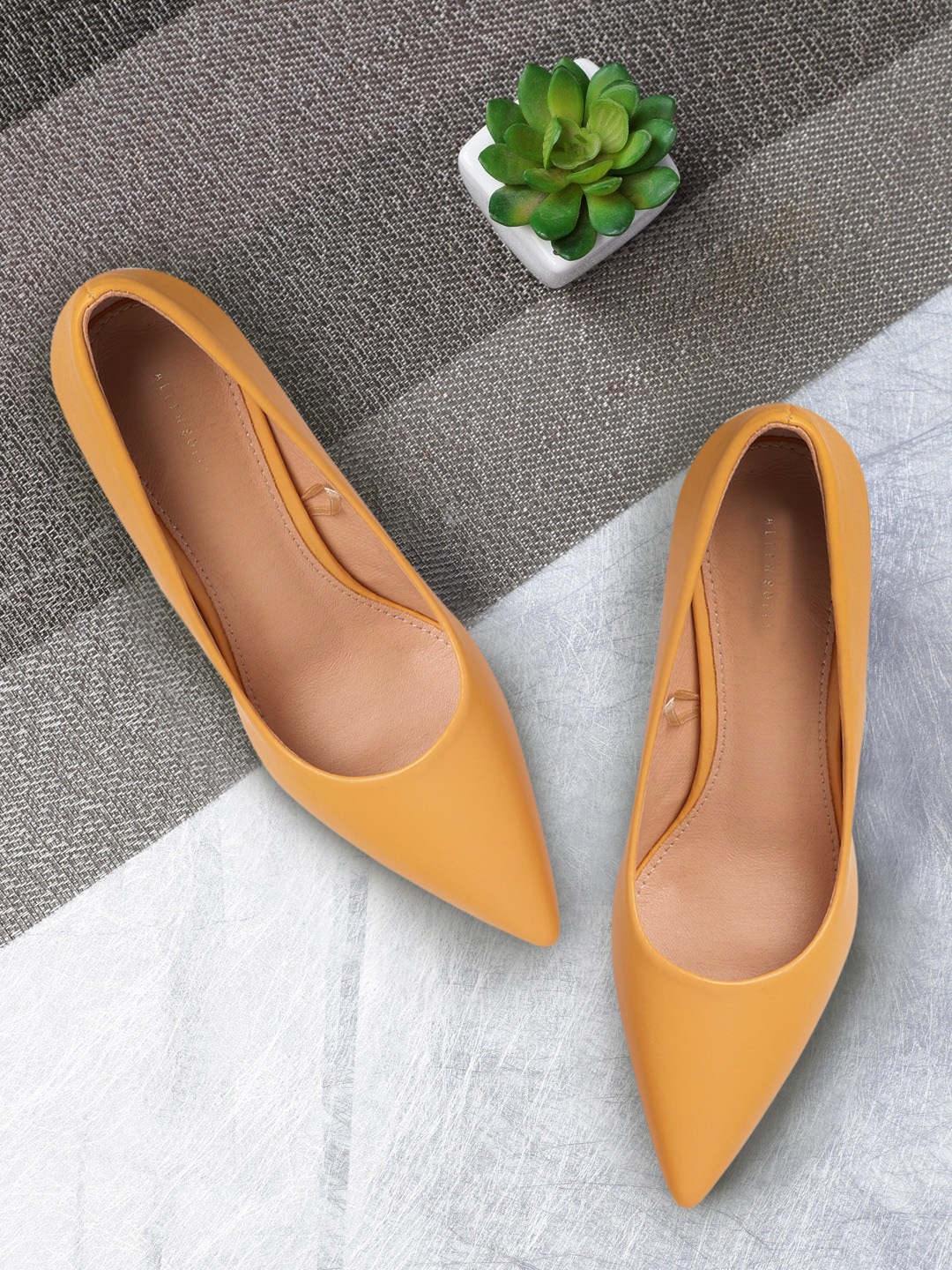

Allen Solly Women Mustard Yellow Solid Pumps