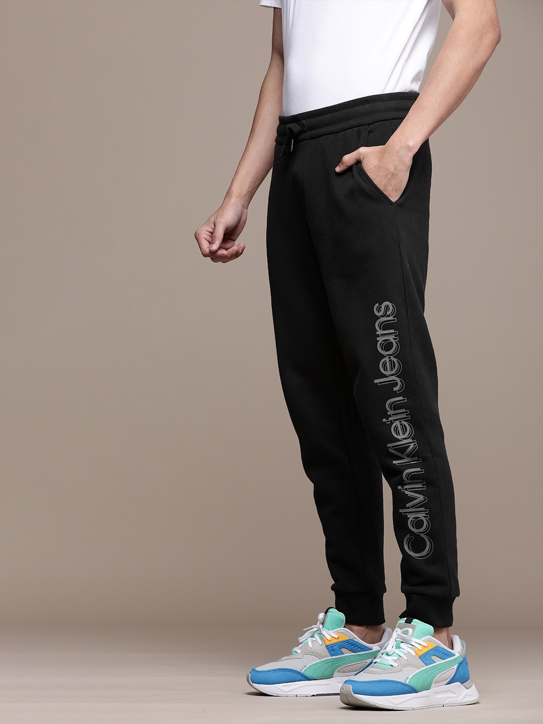 

Calvin Klein Jeans Men Black Brand Logo Printed Regular Fit Joggers