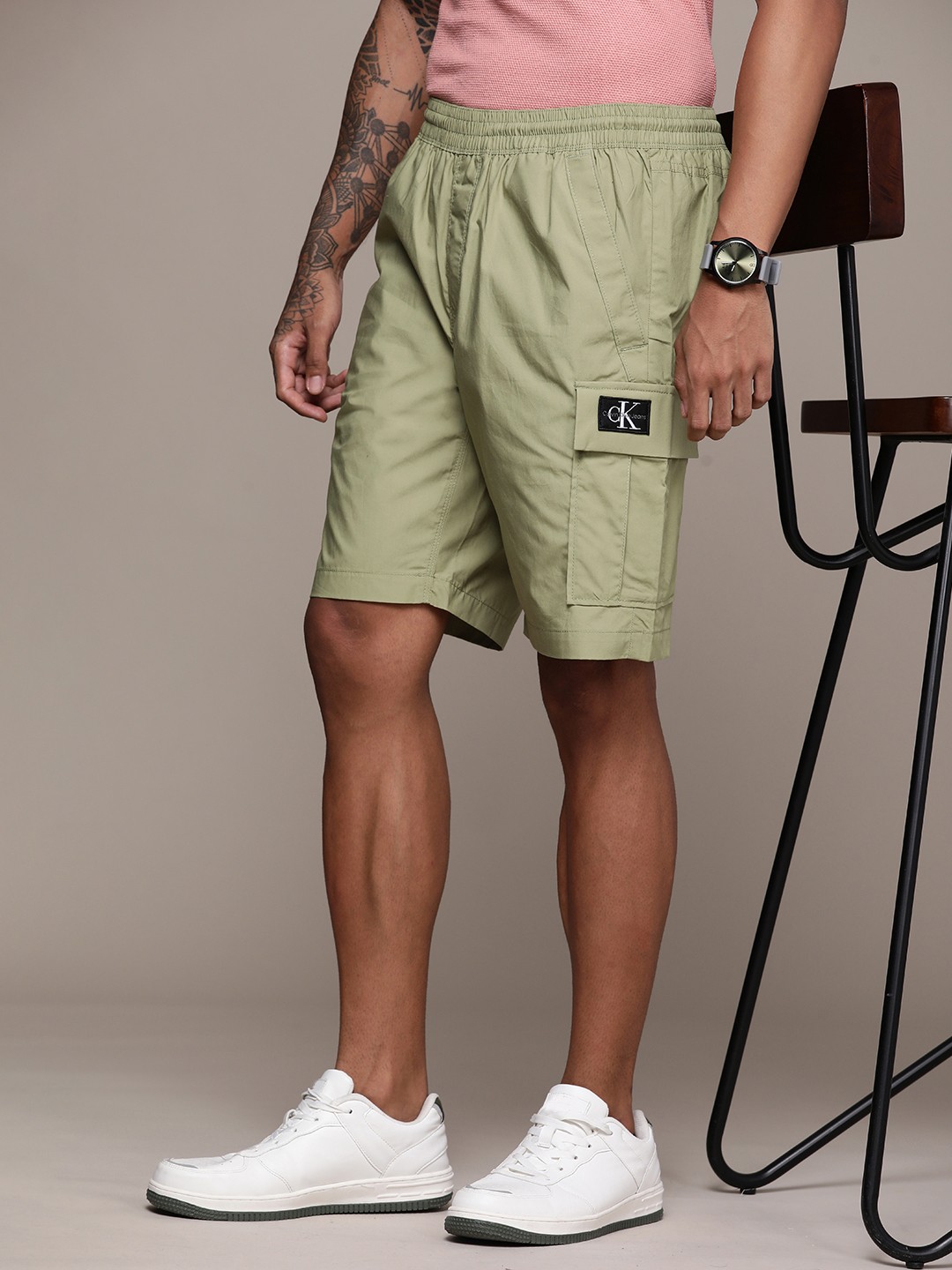 

Calvin Klein Jeans Men Olive Green Brand Logo Printed Pure Cotton Shorts