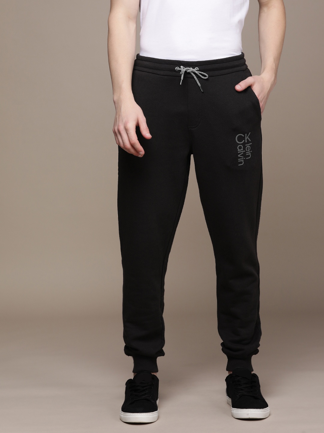 

Calvin Klein Jeans Men Black Brand Logo Printed Regular Joggers
