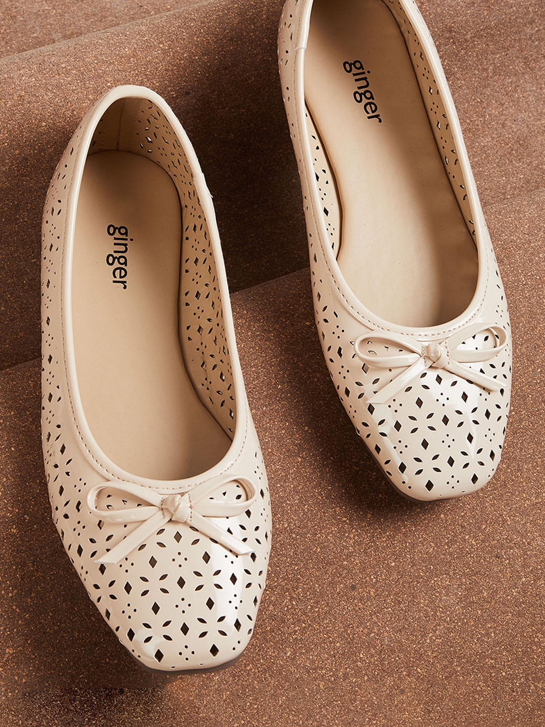 

Ginger by Lifestyle Women Beige Textured Ballerinas with Laser Cuts Flats