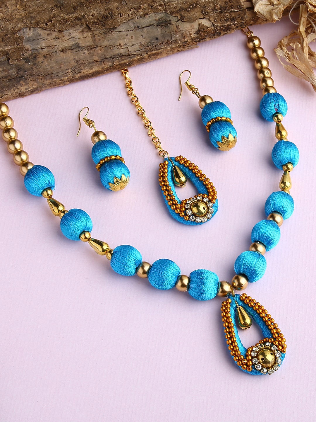

AKSHARA Gold-Toned Blue Wooden Balls Wrapped with Silk Thread Jewellery Set