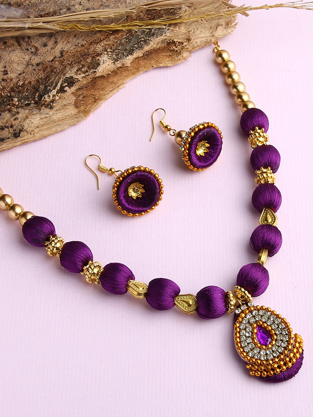 

AKSHARA Gold-Plated White & Purple Stones-Studded & Beaded Wooden Balls Silk Thread Jewellery Set