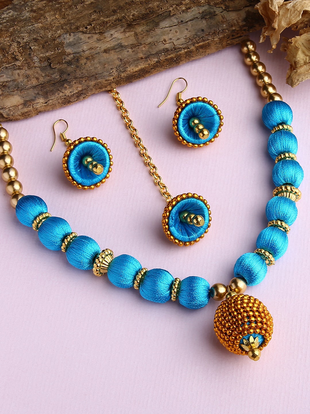 

AKSHARA Gold-Plated White & Blue Stone-Studded & Beaded Wooden Balls Silk Thread Jewellery Set