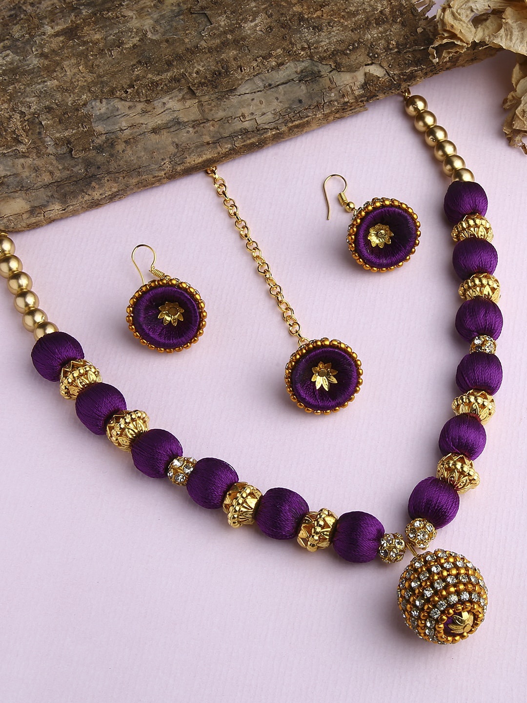 

AKSHARA Gold-Plated White & Purple Stone-Studded & Beaded Wooden Balls Silk Thread Jewellery Set