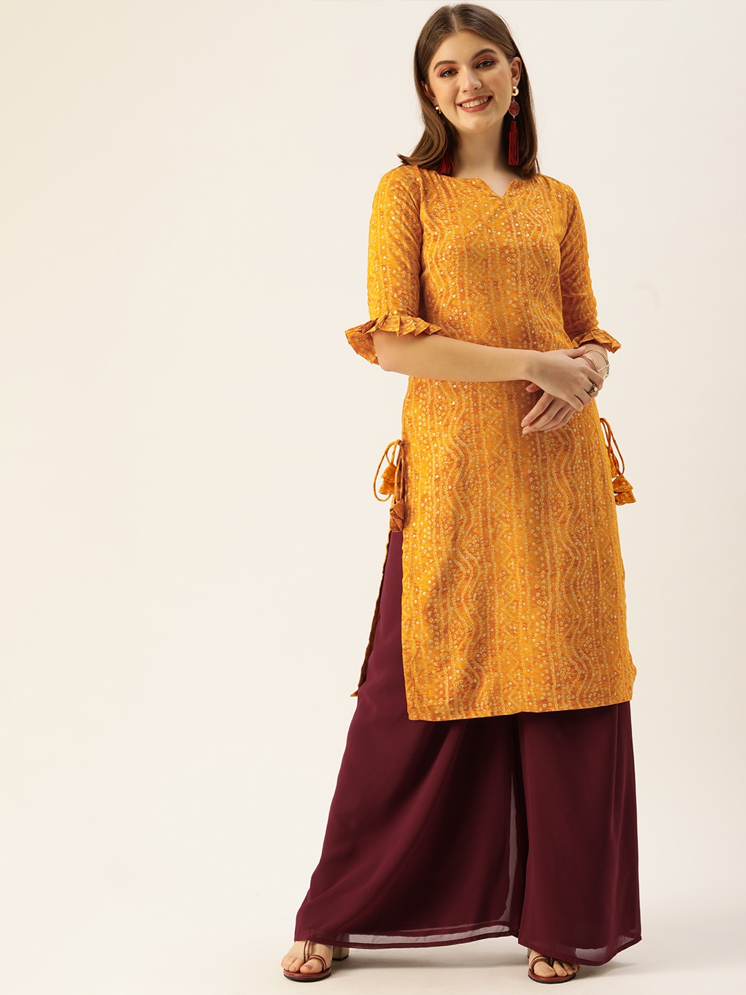 

Ethnovog Women Yellow Printed Kurta with Palazzos