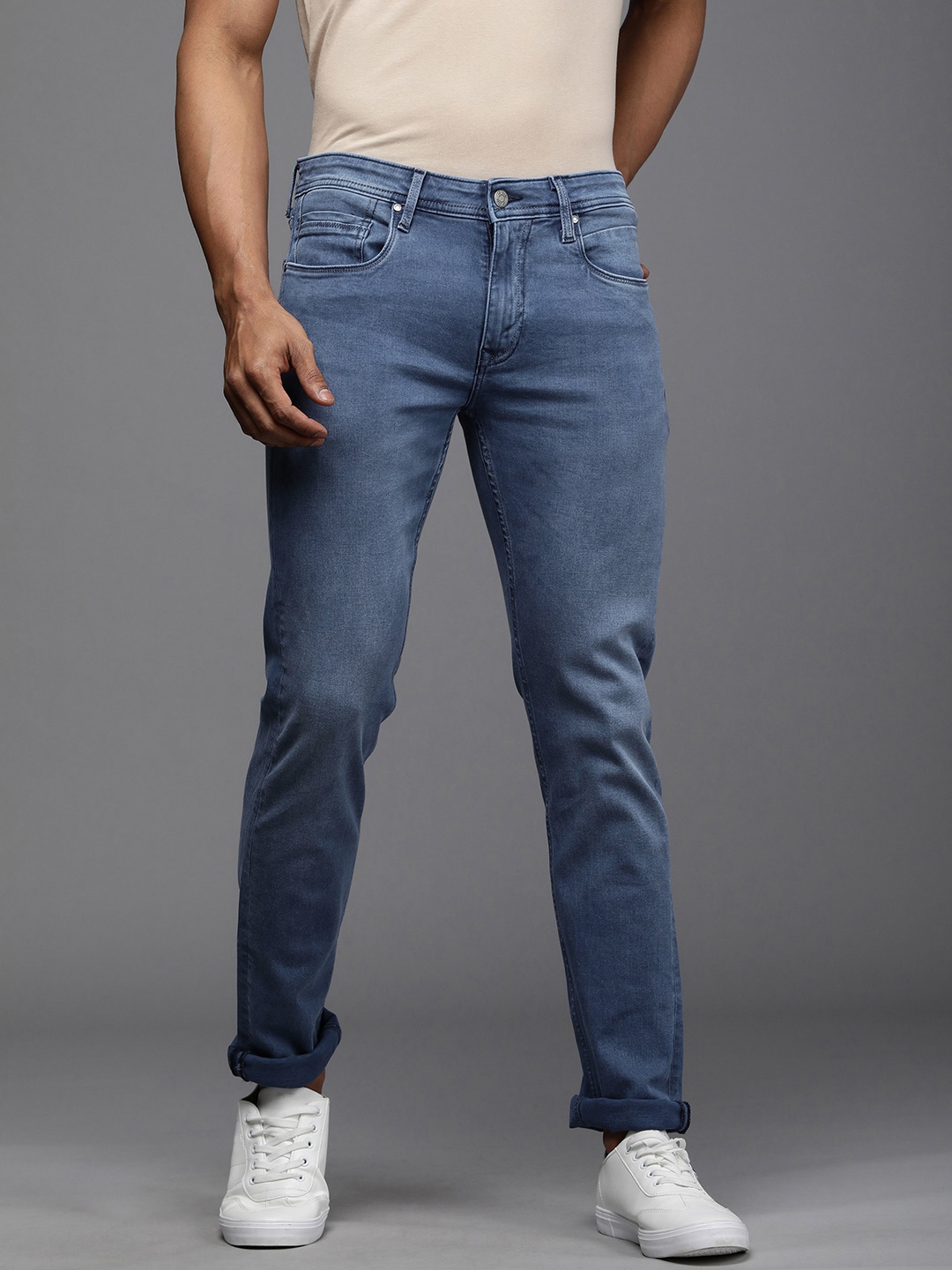 

Louis Philippe Jeans Men Blue Matt Slim Fit Low-Rise Light Fade Stretchable Jeans