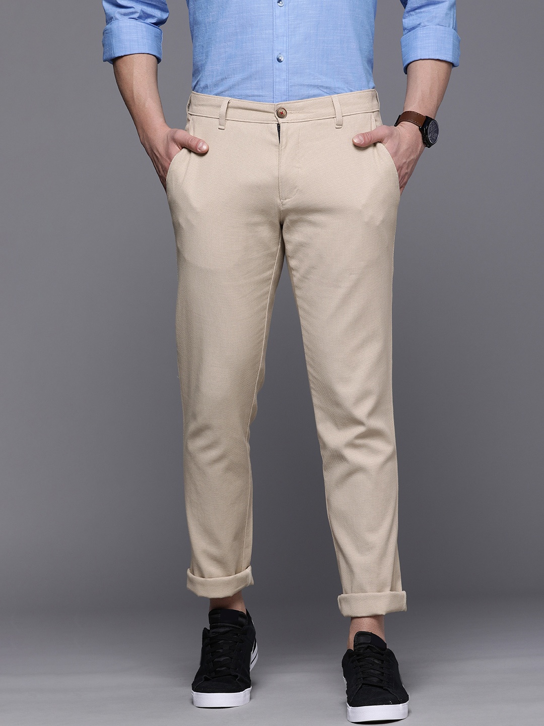 

Louis Philippe Sport Men Beige Textured Slim Fit Trousers