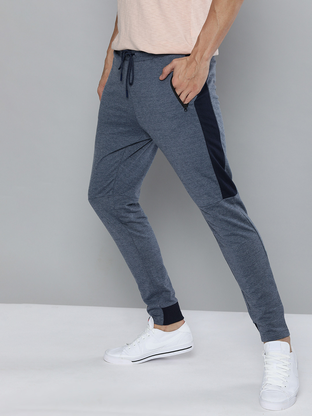 

Mast & Harbour Men Blue Melange Solid Regular Fit Mid-Rise Knitted Regular Track Pants