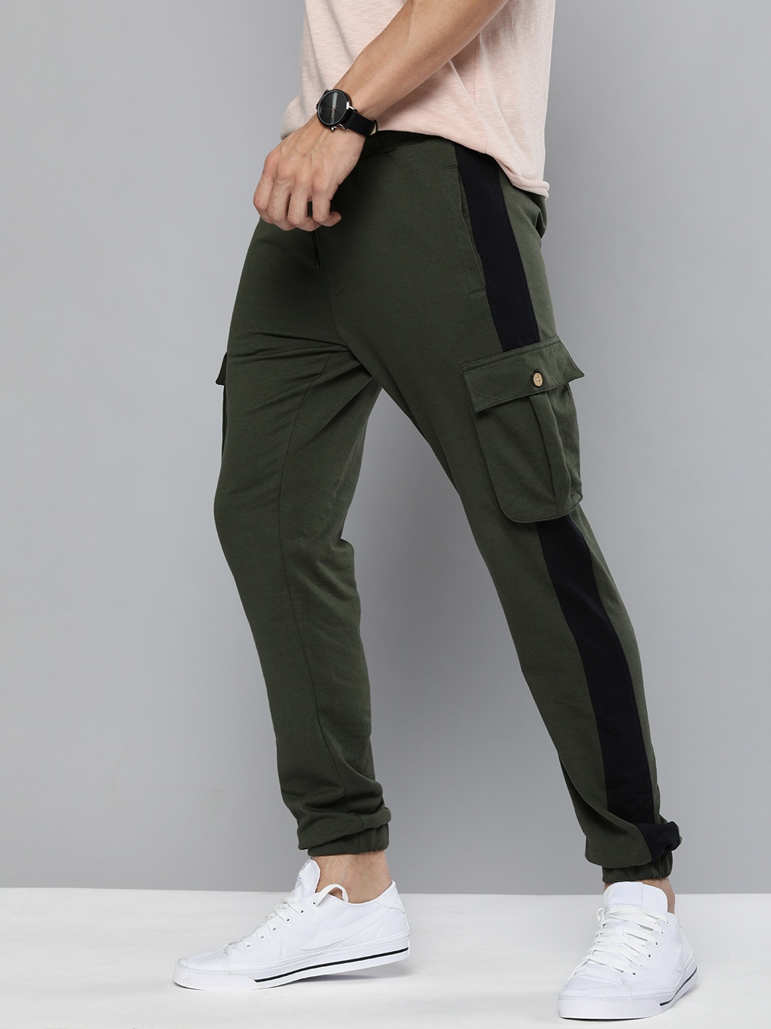 

Mast & Harbour Men Olive Green Solid Slim Fit Joggers With Side Stripes