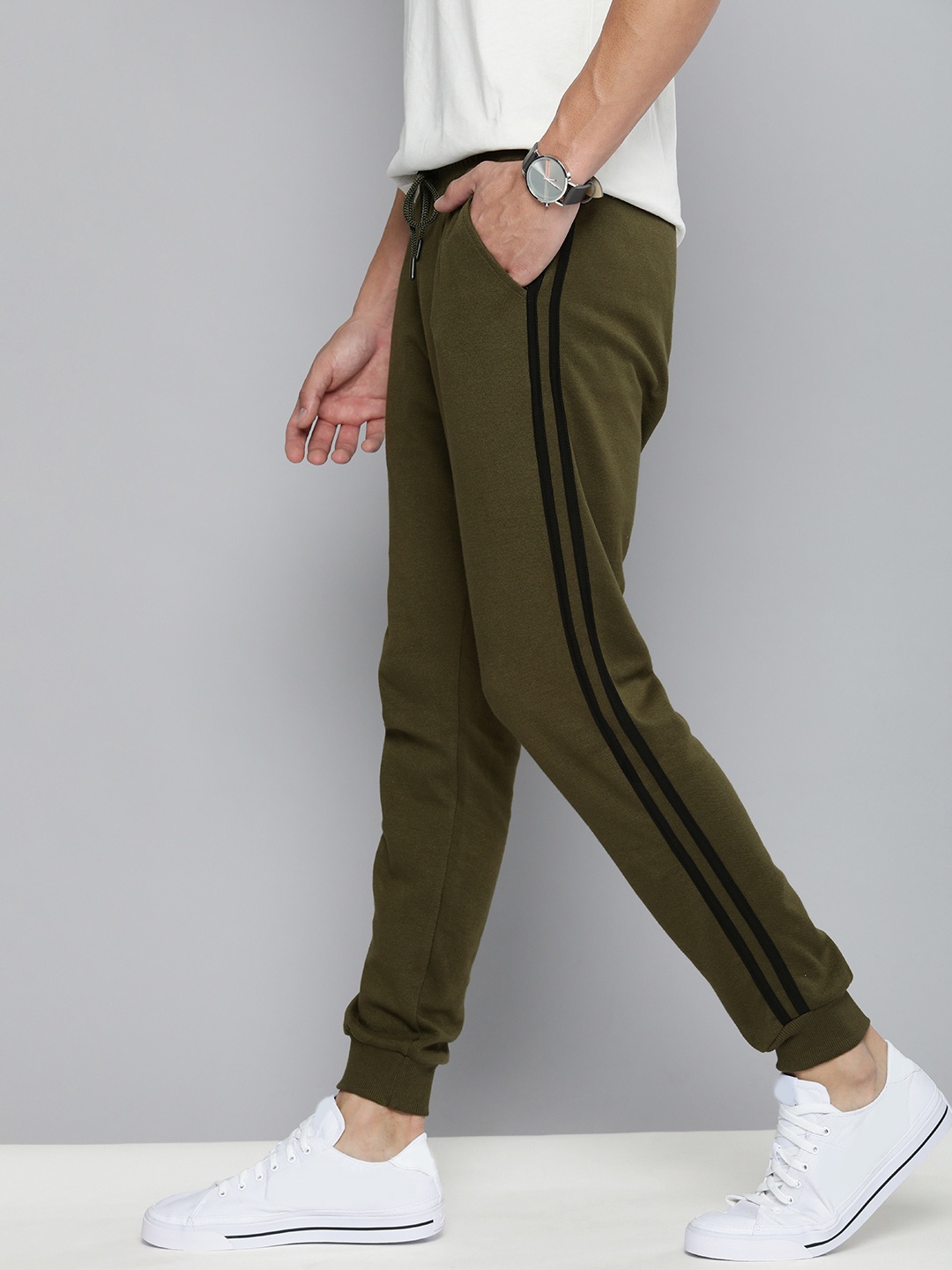 

Mast & Harbour Men Olive Green & Black Solid Joggers with Side Stripes