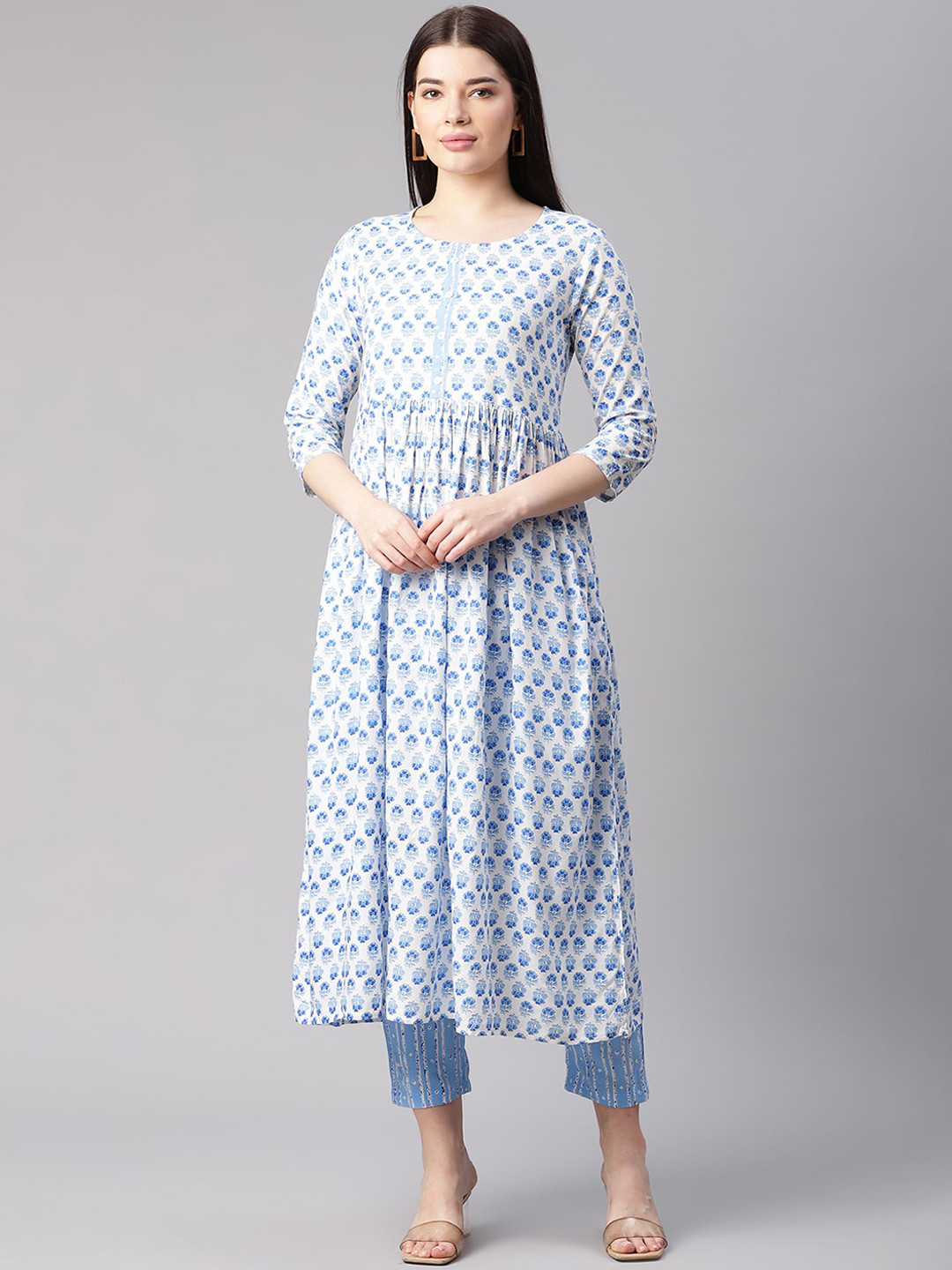 

Sringam Woman White Printed Kurta with Trousers