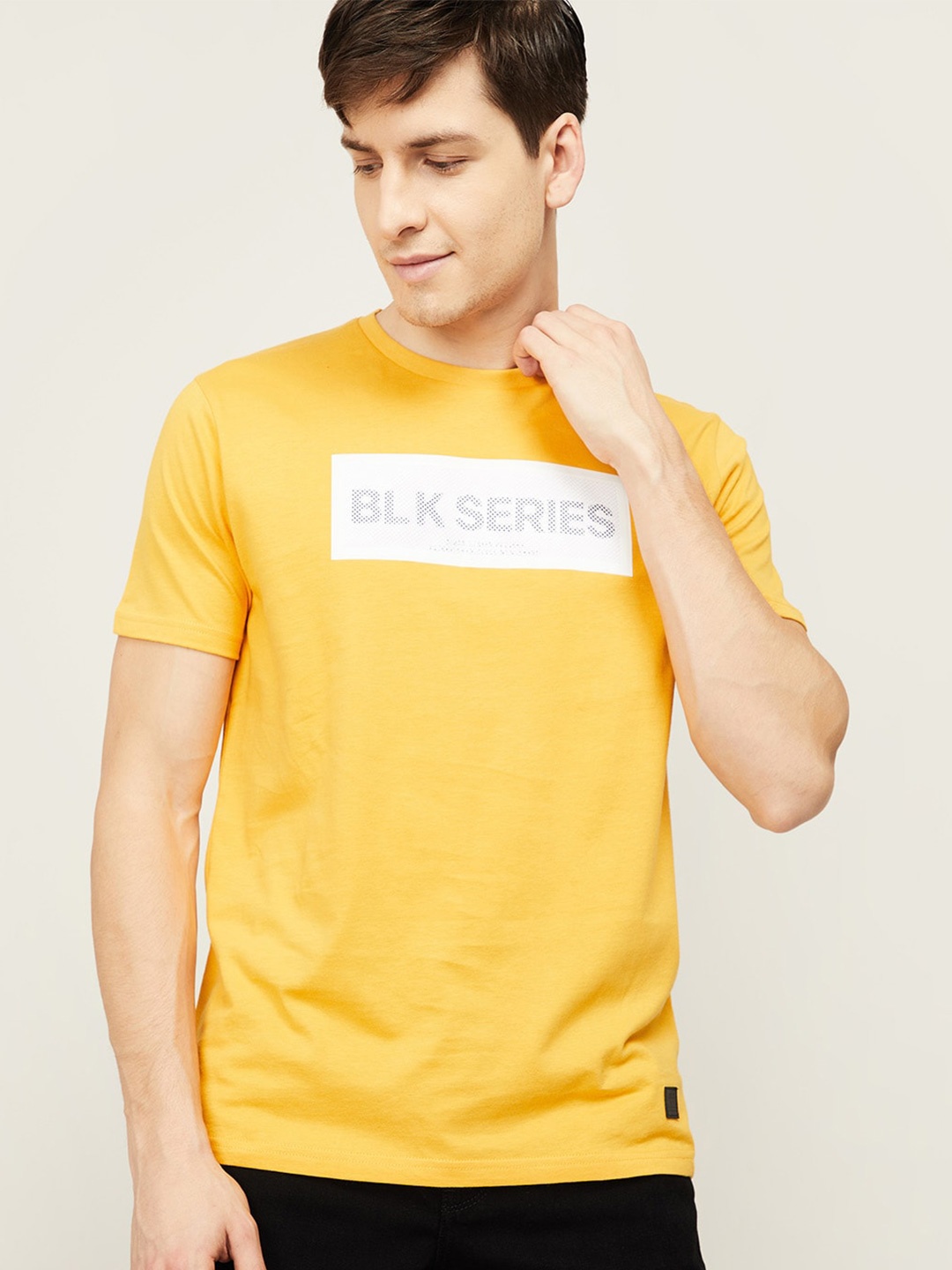 

Bossini Men Yellow Typography Printed T-shirt