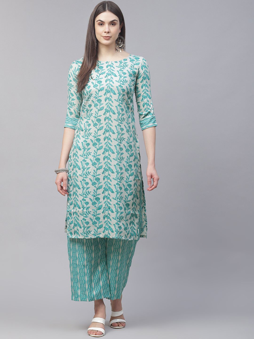 

Sasimo Women Turquoise Blue Floral Printed Kurta with Palazzos