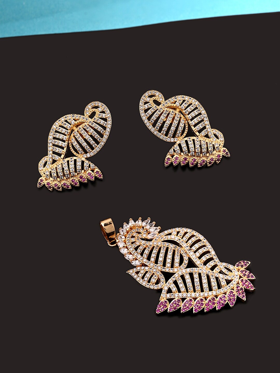 

Voylla Women Gold Plated Mayur Pendant and Earing Set