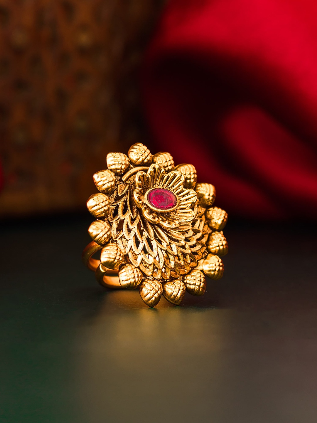 

aadita Gold-Plated & Pink AD-Studded Adjustable Finger Ring