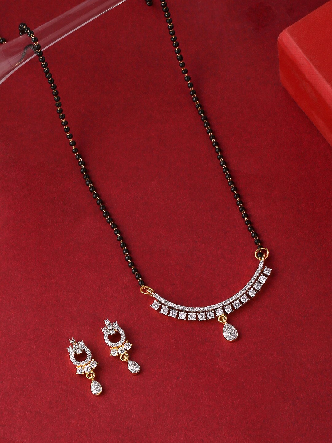 

THE AAB STUDIO Gold-Plated Black Beaded & AD-Studded Mangalsutra with Earrings