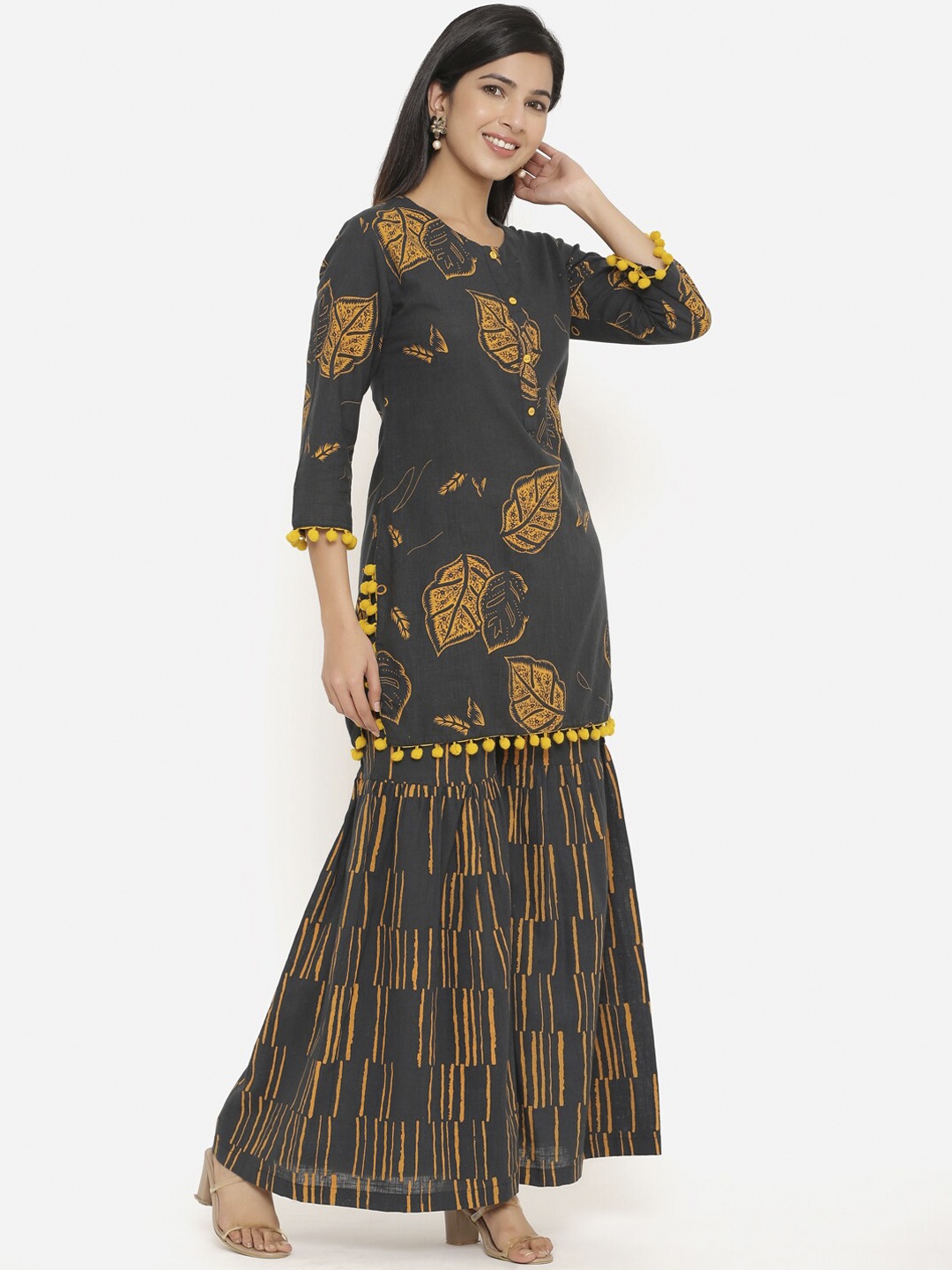 

Aprique FAB Women Black & Mustard Printed Thread Work Kurta With Sharara