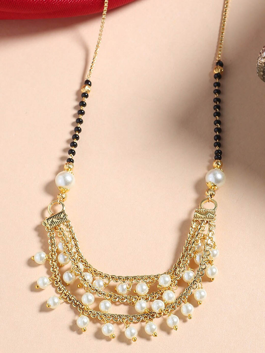 

Shoshaa Woman Gold-Plated Black Pearl Beaded Mangalsutra