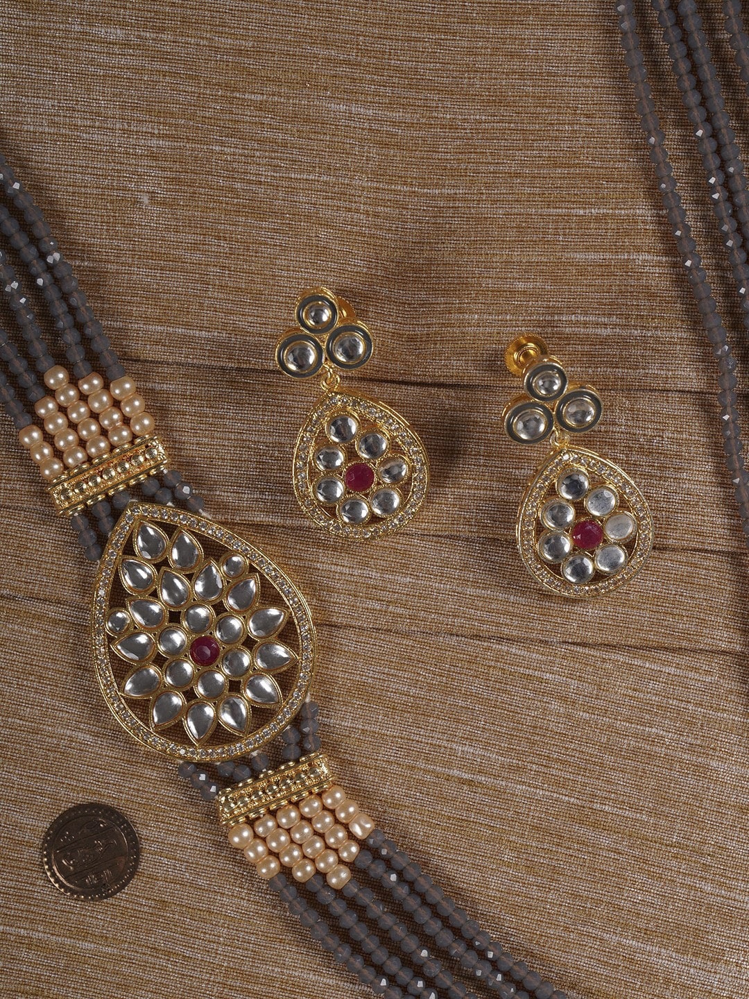 

Shoshaa Gold-Plated White Kundan-Studded & Grey Beaded Jewellery Set
