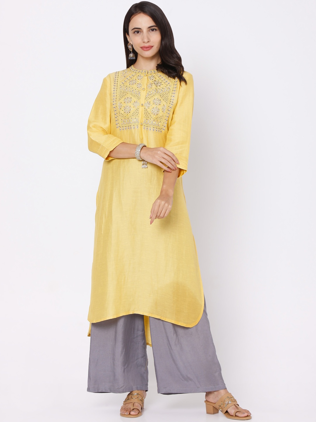 

Ojas Designs Women Yellow Floral Embroidered Linen Kurta With Palazzos