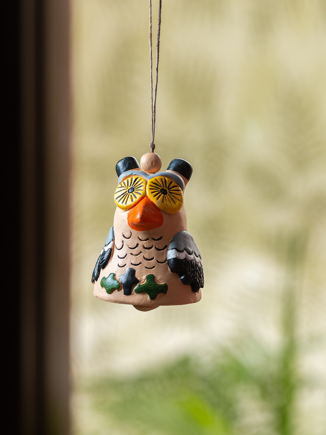 

ExclusiveLane Beige & Black Wise Owl Handmade Terracotta Windchime