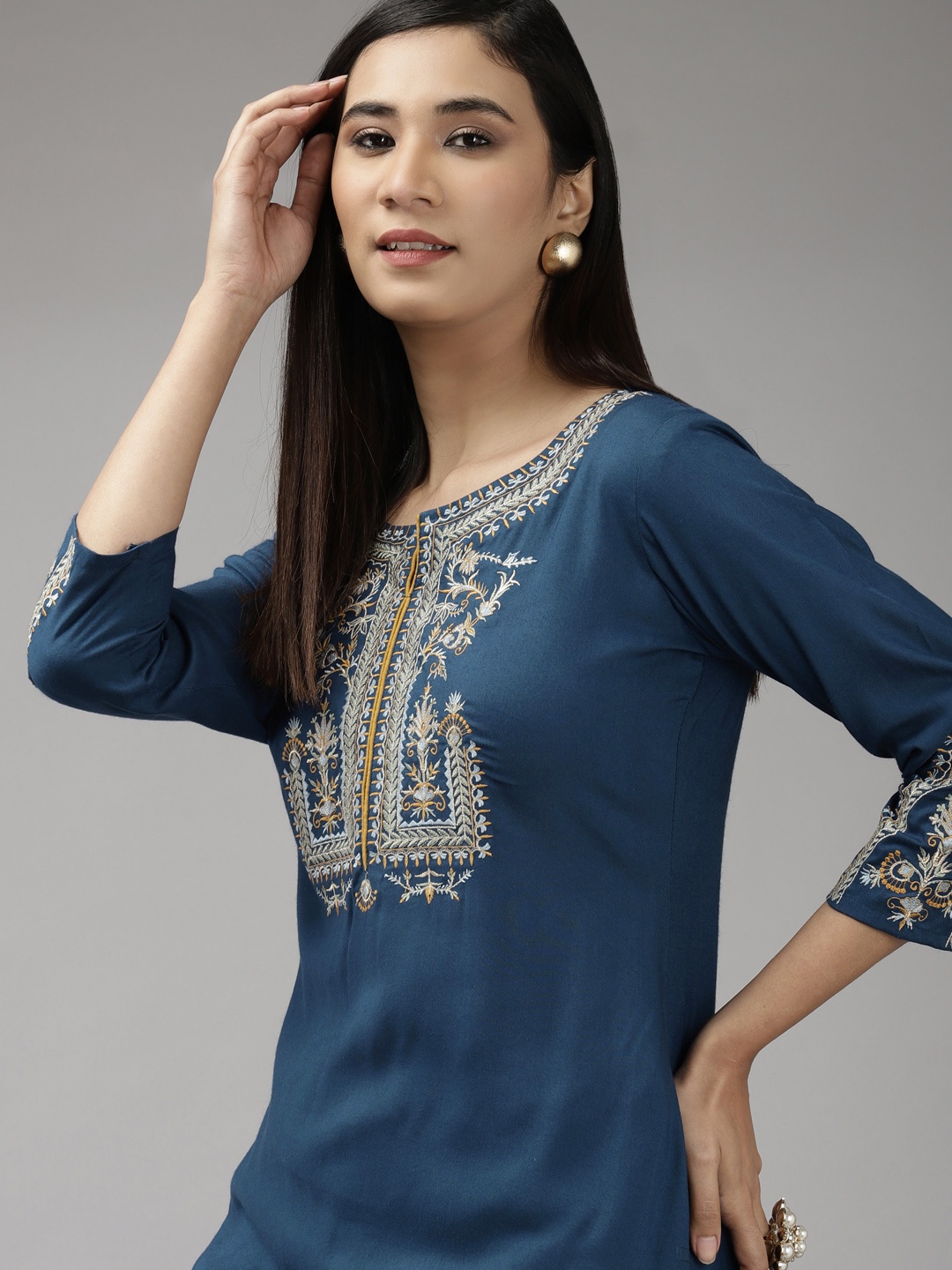

Yufta Women Teal Blue Ethnic Motifs Yoke Design Thread Work Kurta with Trousers