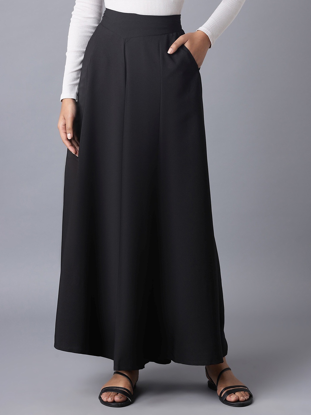 

elleven Women Black Flared Palazzos