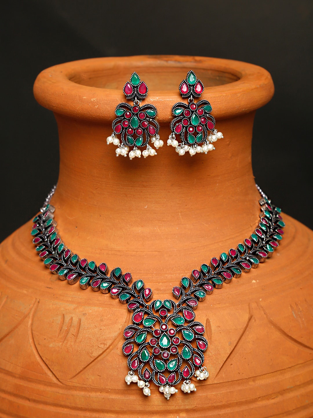 

Yellow Chimes Silver Plated Pink & Green Stone Studded Oxidised Jewellery Set