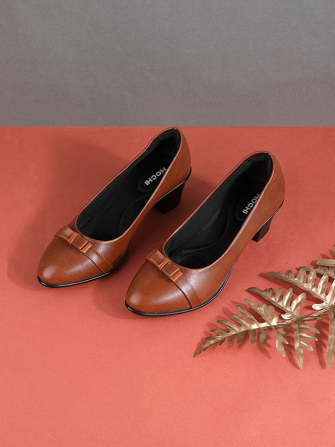 

Mochi Tan Block Pumps with Bows