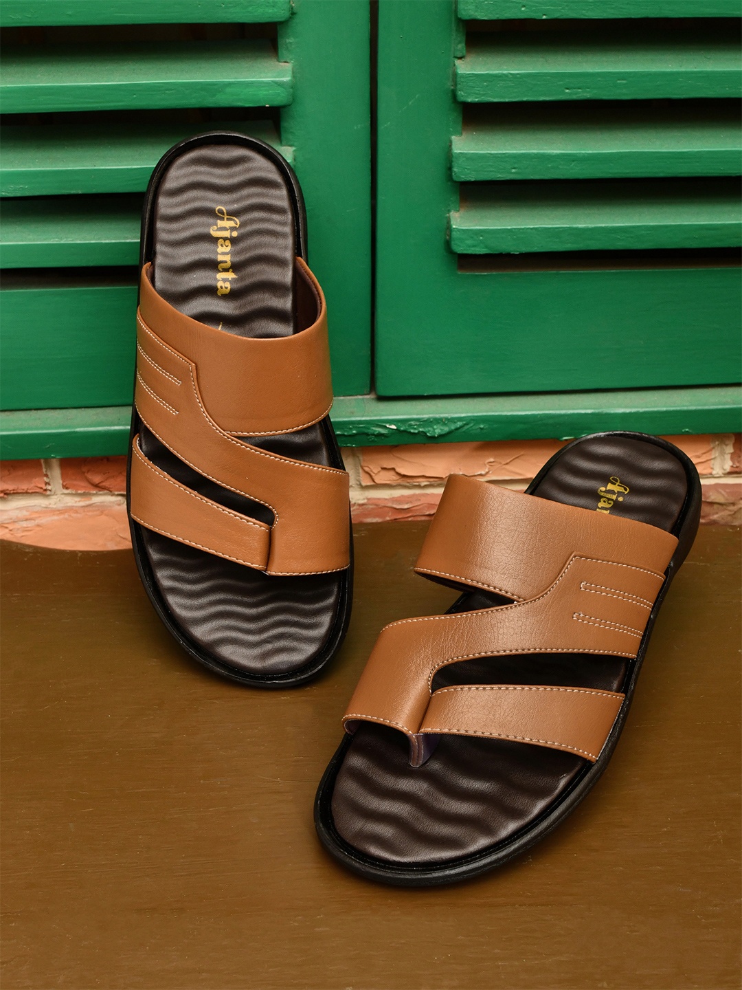 

Ajanta Men Tan Comfort Sandals