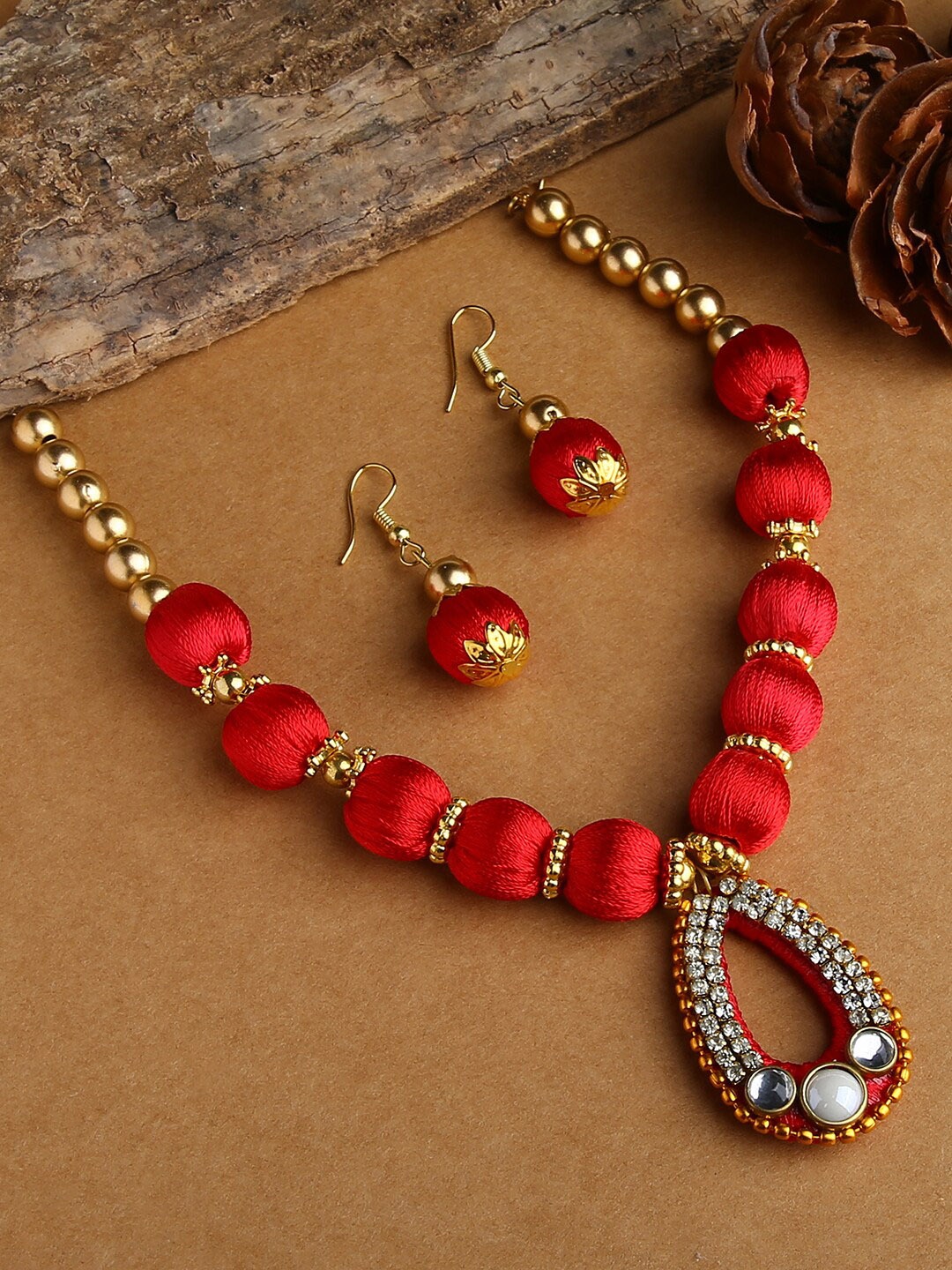 

AKSHARA Gold-Plated Red & White Stone-Studded & Beaded Jewellery Set
