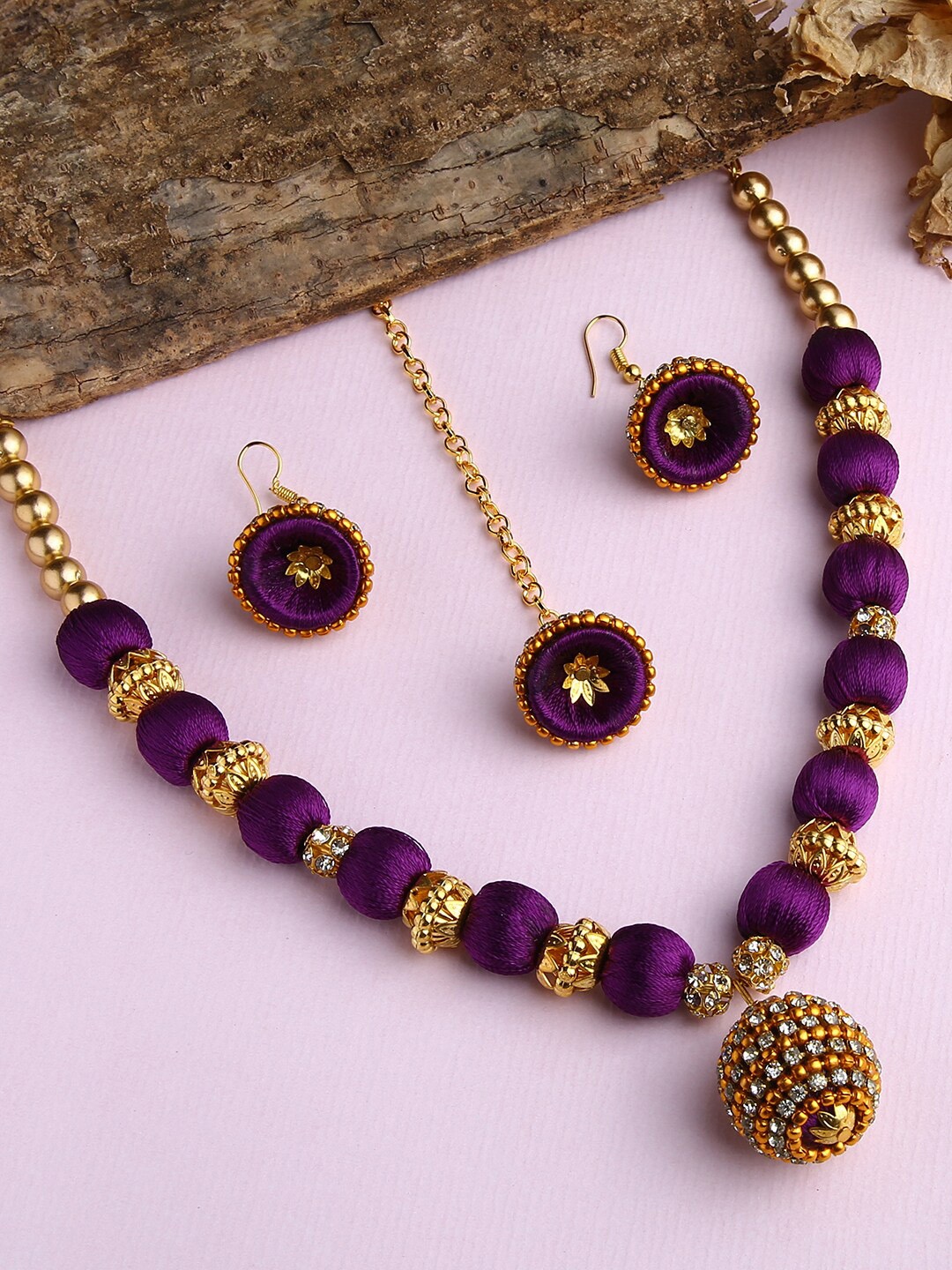

AKSHARA Gold-Plated Purple & White Stone-Studded & Beaded Jewellery Set