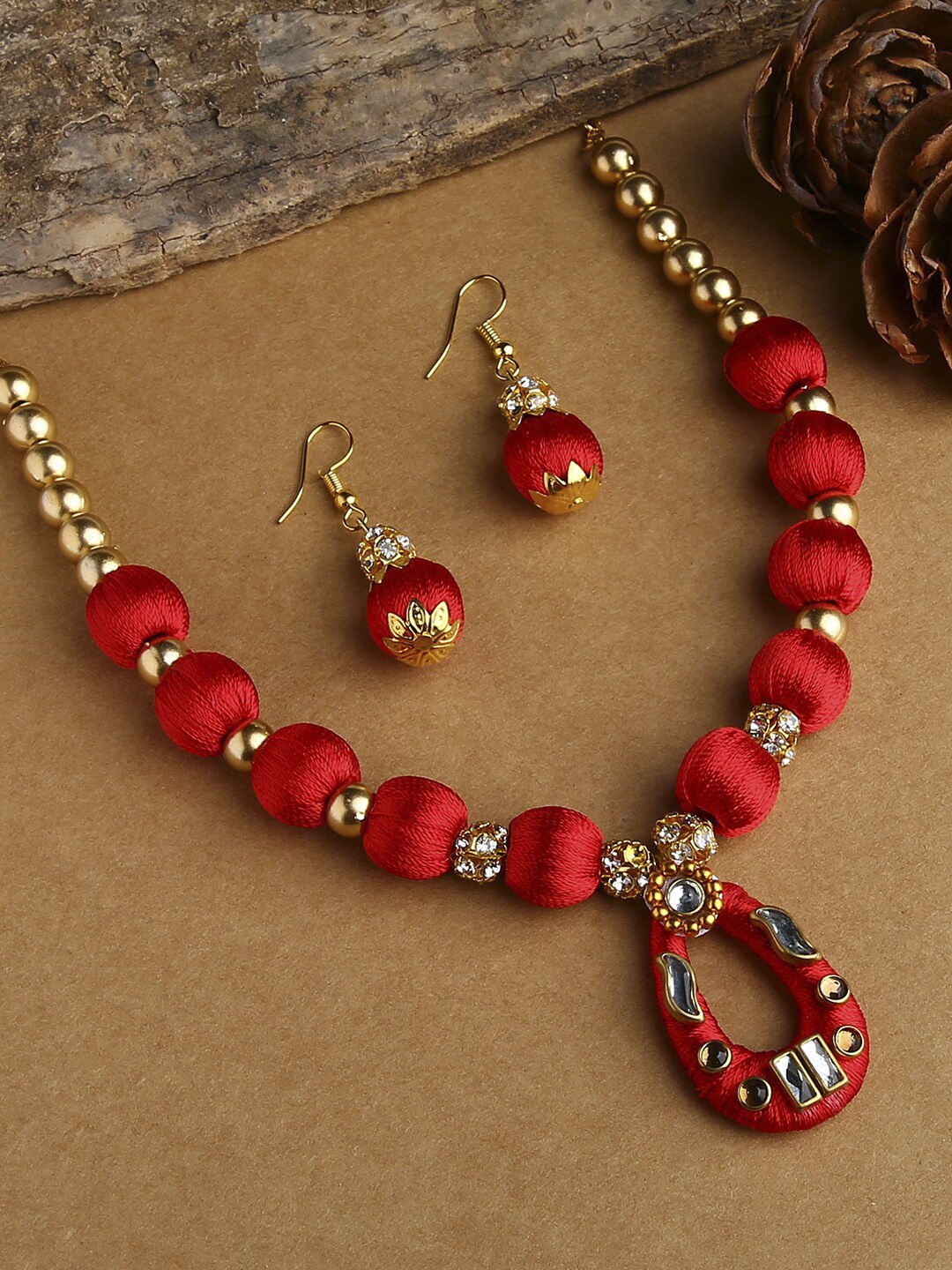 

AKSHARA Women Red Stone-Studded & Beaded Silk Thread Jewelry Set