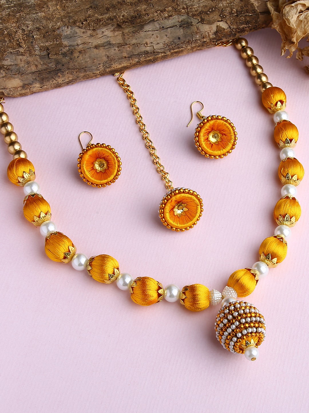 

AKSHARA Gold-Plated White & Yellow Stone Studded & Beaded Wooden Ball Silk Thread Jewellery Set