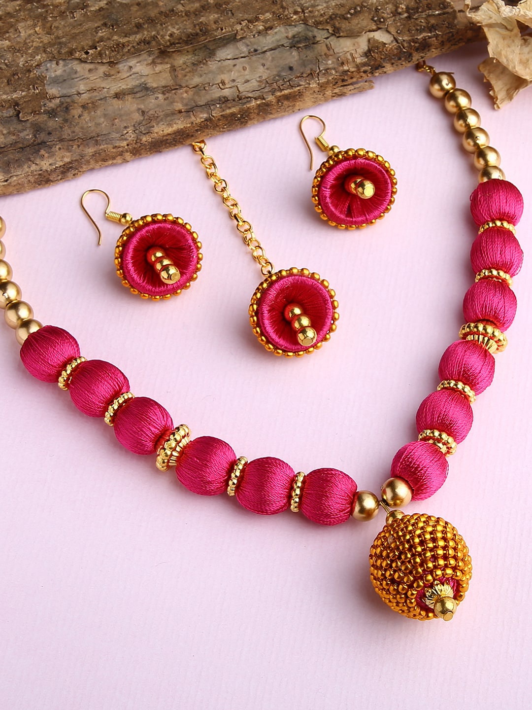 

AKSHARA Gold-Plated Pink Stone-Studded & Beaded Wooden Balls Silk Thread Jewellery Set