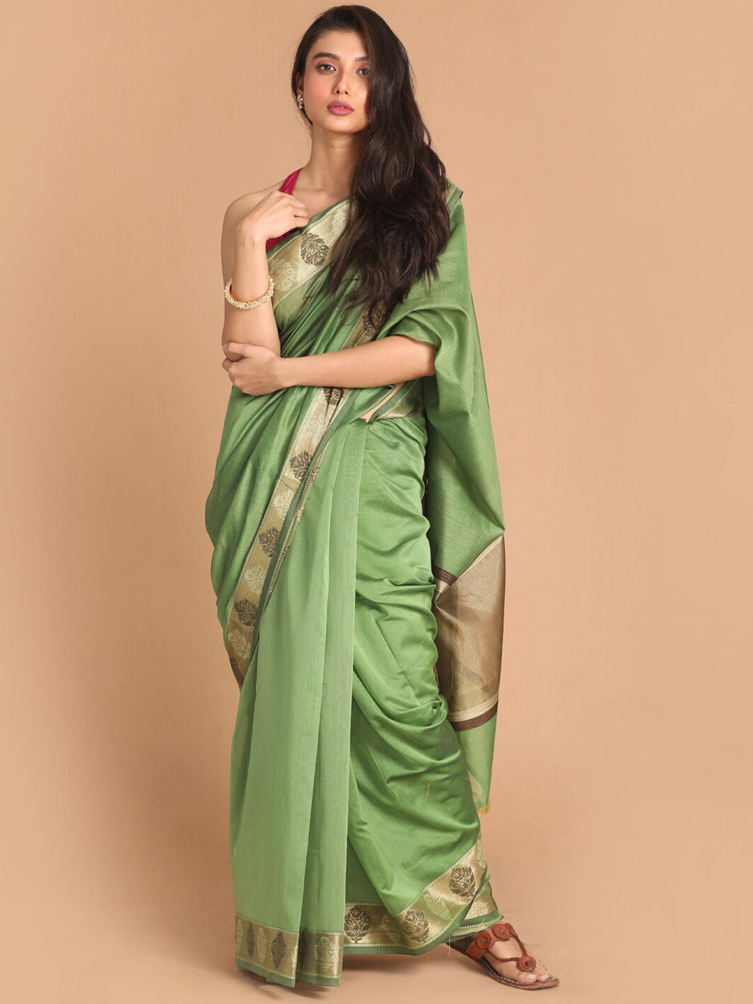 

Indethnic Green Zari Banarasi Saree