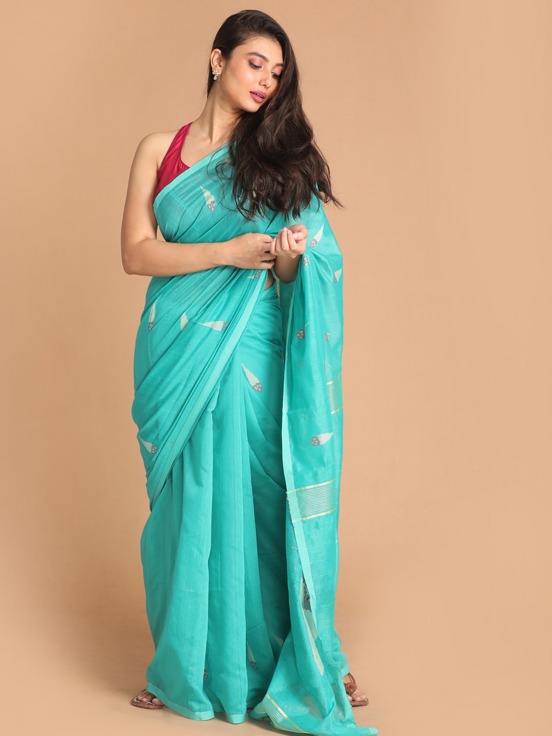 

Indethnic Women Sea Green Woven Design Cotton Blend Jamdani Saree