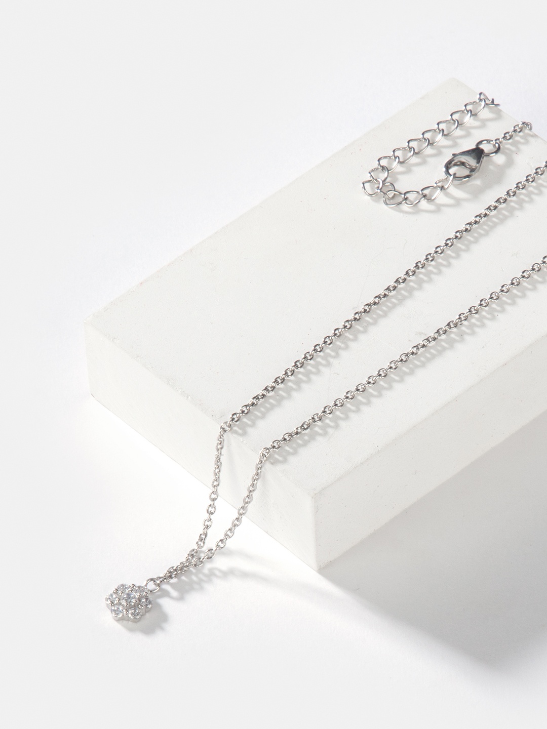 

SHAYA Women Silver-Toned Stone Studded A Thousand Years Pendant Necklace