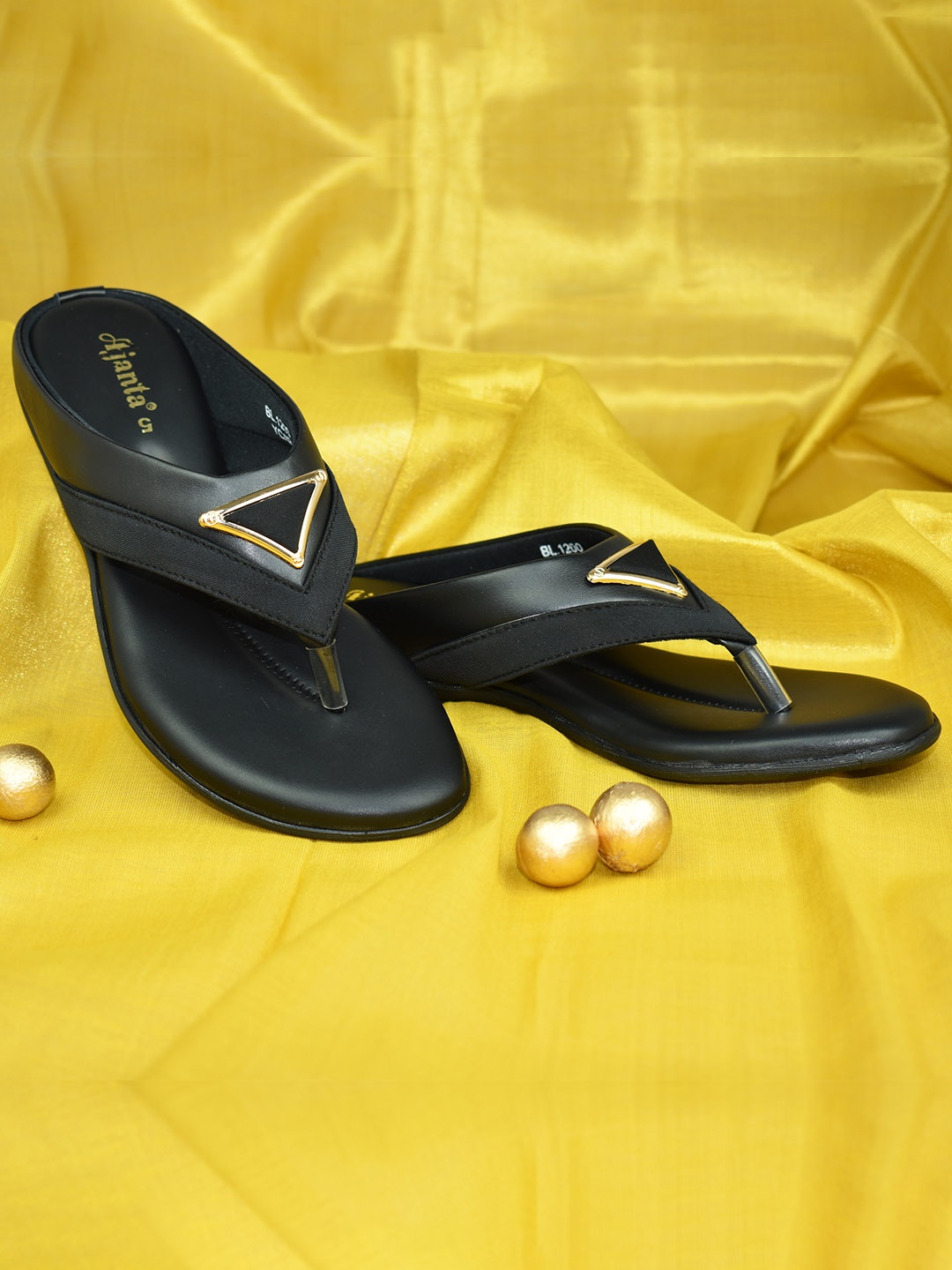 

Ajanta Women Black T-Strap Flats