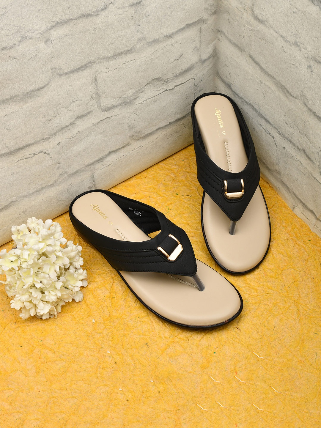 

Ajanta Women Black T-Strap Flats