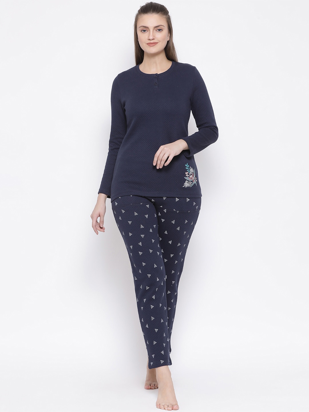 

Kanvin Women Navy Blue & White Printed Quilted Winter wear Night suit