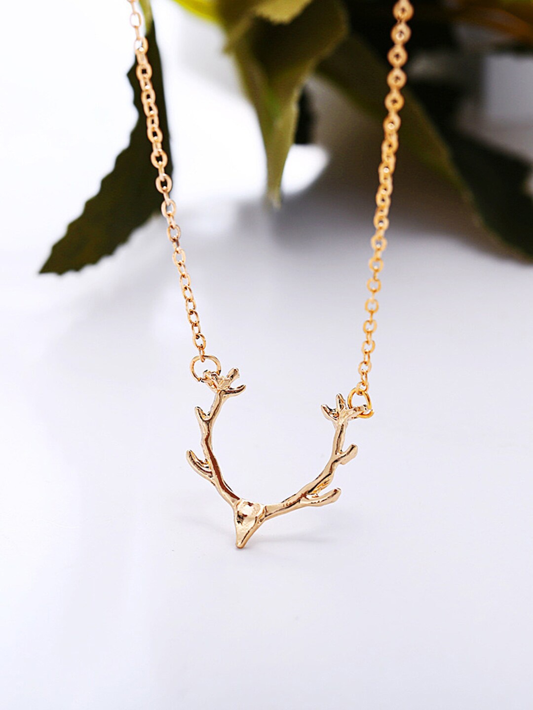 

Vembley Women Gold-Plated Enamelled Reindeer Horn Necklace