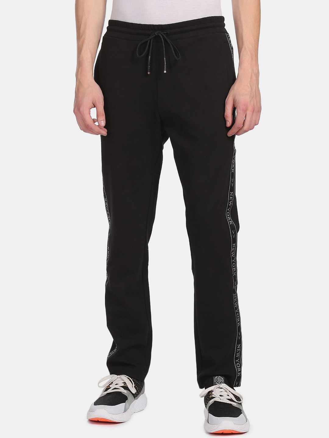

Arrow New York Men Black Mid-Rise Trousers
