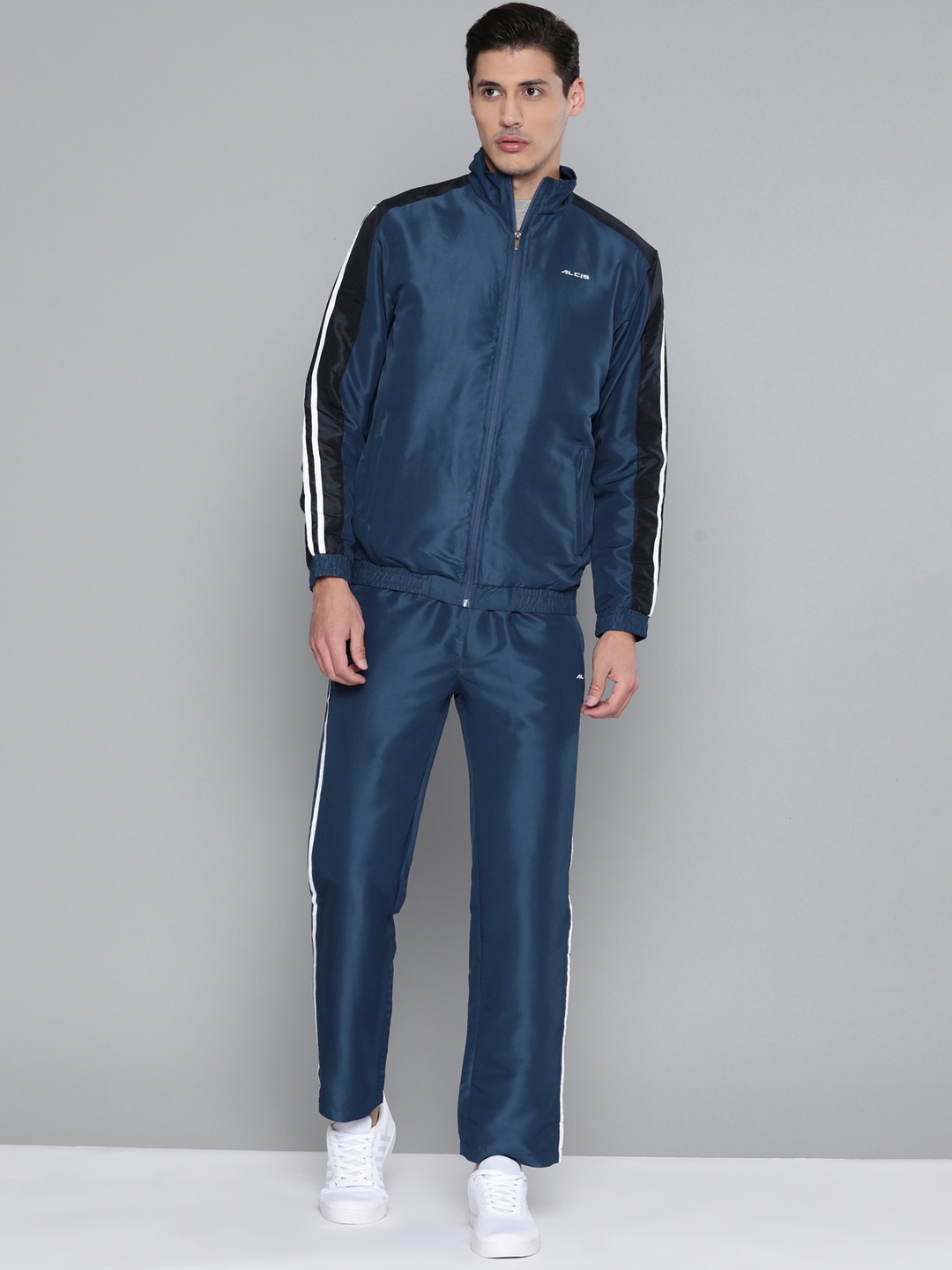 

Alcis Men Teal Blue Solid Tracksuit With Side Taping on Sleeves