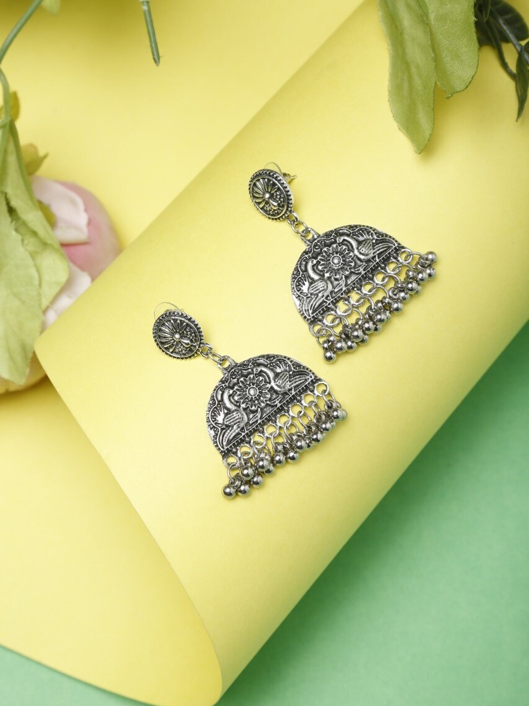 

NEUDIS Silver-Toned Dome Shaped Jhumkas Earrings