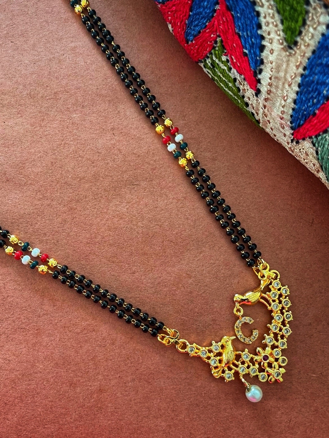 

Digital Dress Room Gold-Plated Black & White Beaded & Stone-Studded C-Alphabet Mangalsutra