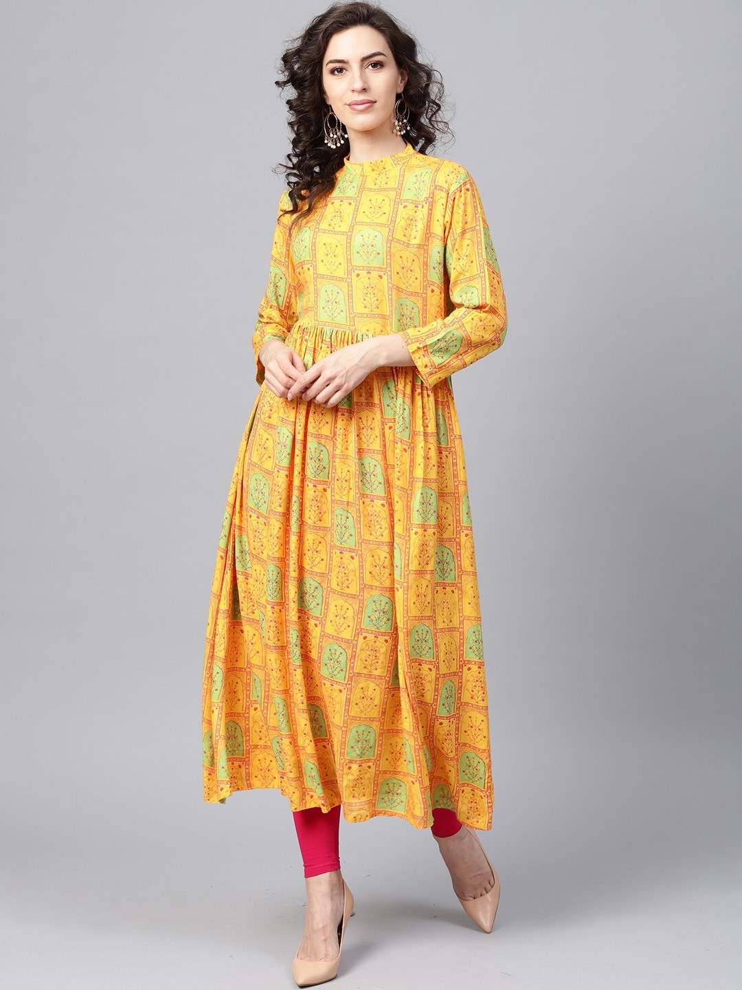 

Indo Era Women Yellow Ethnic Motifs Printed Dobby Anarkali Kurta